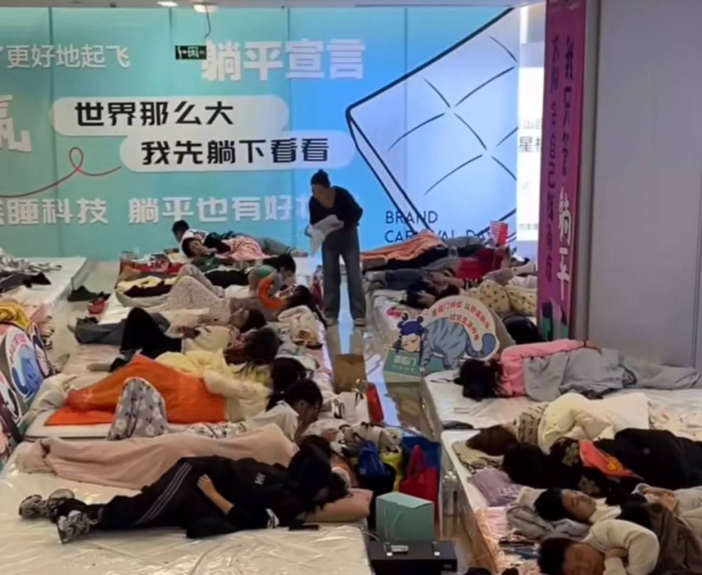 A 23-year-old wins China’s ‘lying flat’ contest after staying on a mattress for 33 hours, highlighting a growing trend among young people embracing low-stress lifestyles.