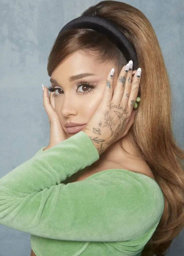 Ariana Grande Spotify monthly listeners hit a record 123.8 million, making her the first woman to top Spotify’s monthly listeners chart five times after a holiday streaming surge.