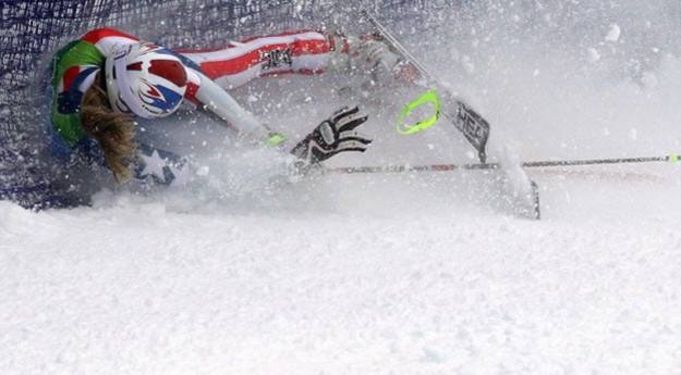 Lindsey Vonn injures knee one week before 2026 Olympics after crashing in the World Cup downhill in Switzerland, putting her Olympic participation in doubt.