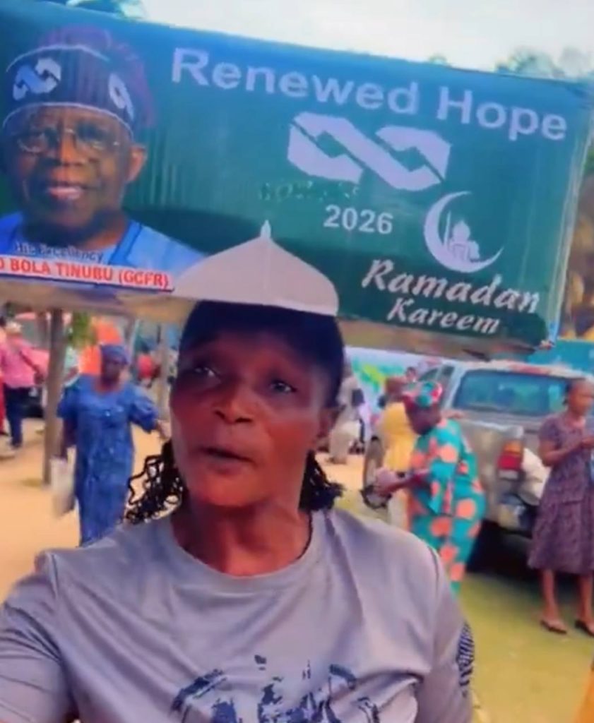 Nigerian woman prays for Tinubu’s reelection in a viral video after receiving Ramadan palliatives in Lagos, sparking debate online about poverty, welfare aid and political loyalty.