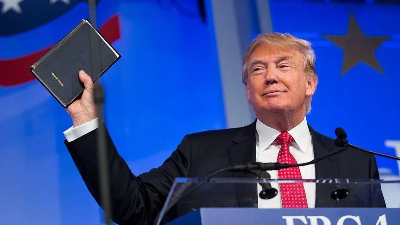 Donald Trum holding a Bible