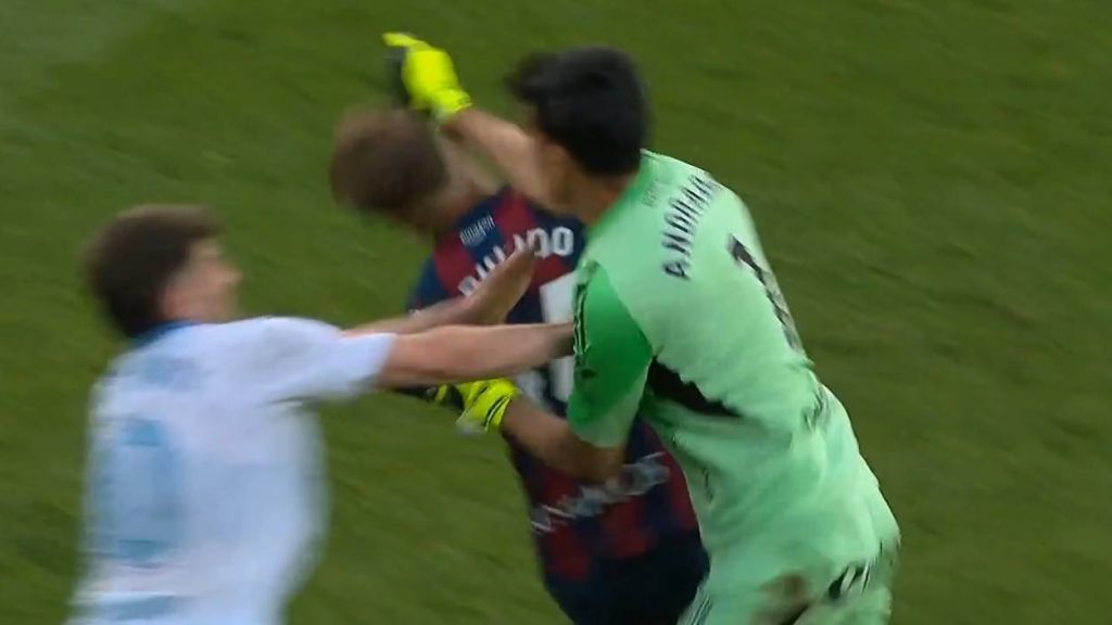 Real Zaragoza goalkeeper punches player Jorge Pulido during heated derby clash, sparking brawl and possible long ban after red card incident in Spain.