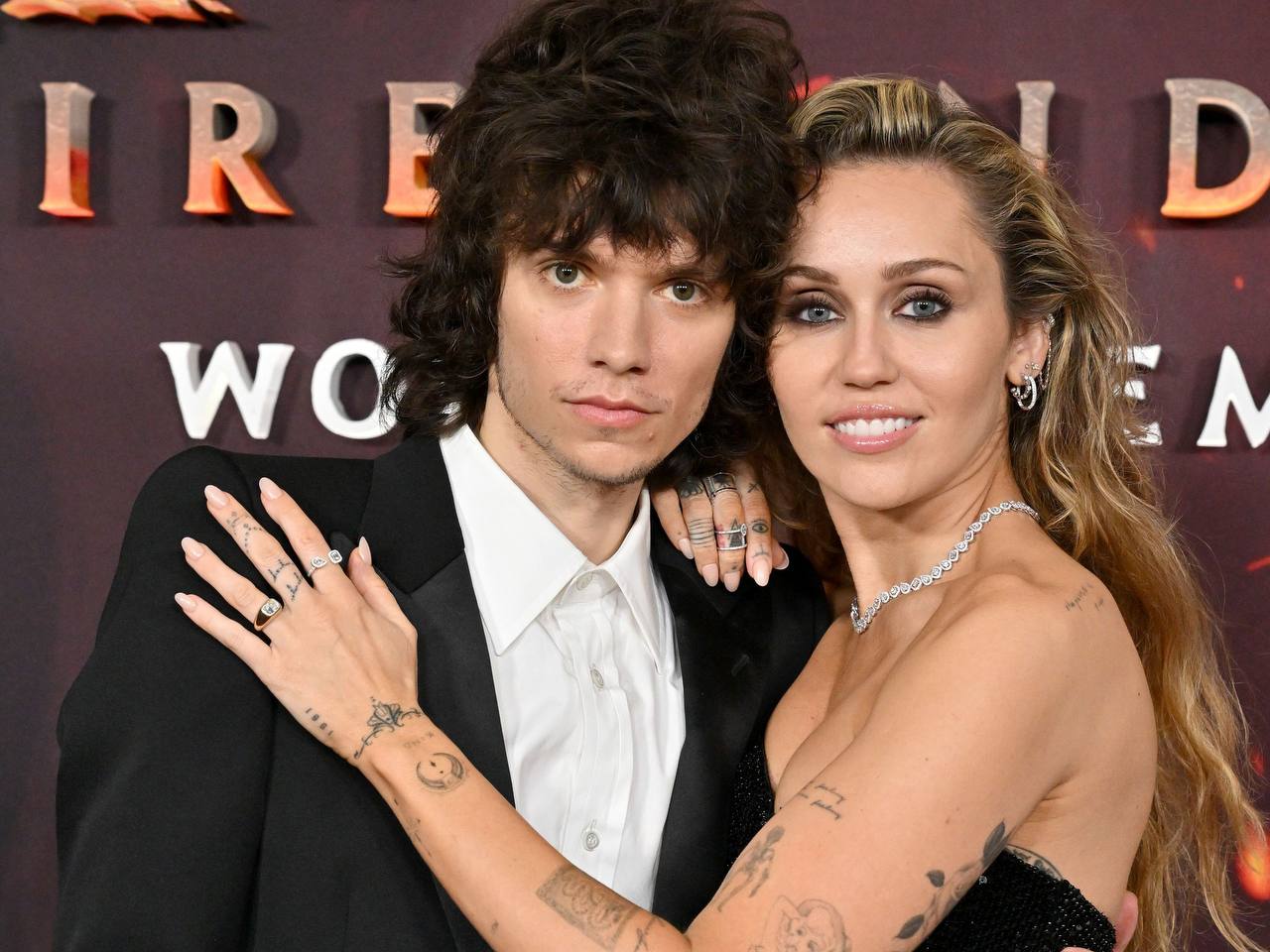 Miley Cyrus confirms engagement to drummer Maxx Morando, revealing details of a surprise proposal in Japan after four years together and plans for a private wedding.